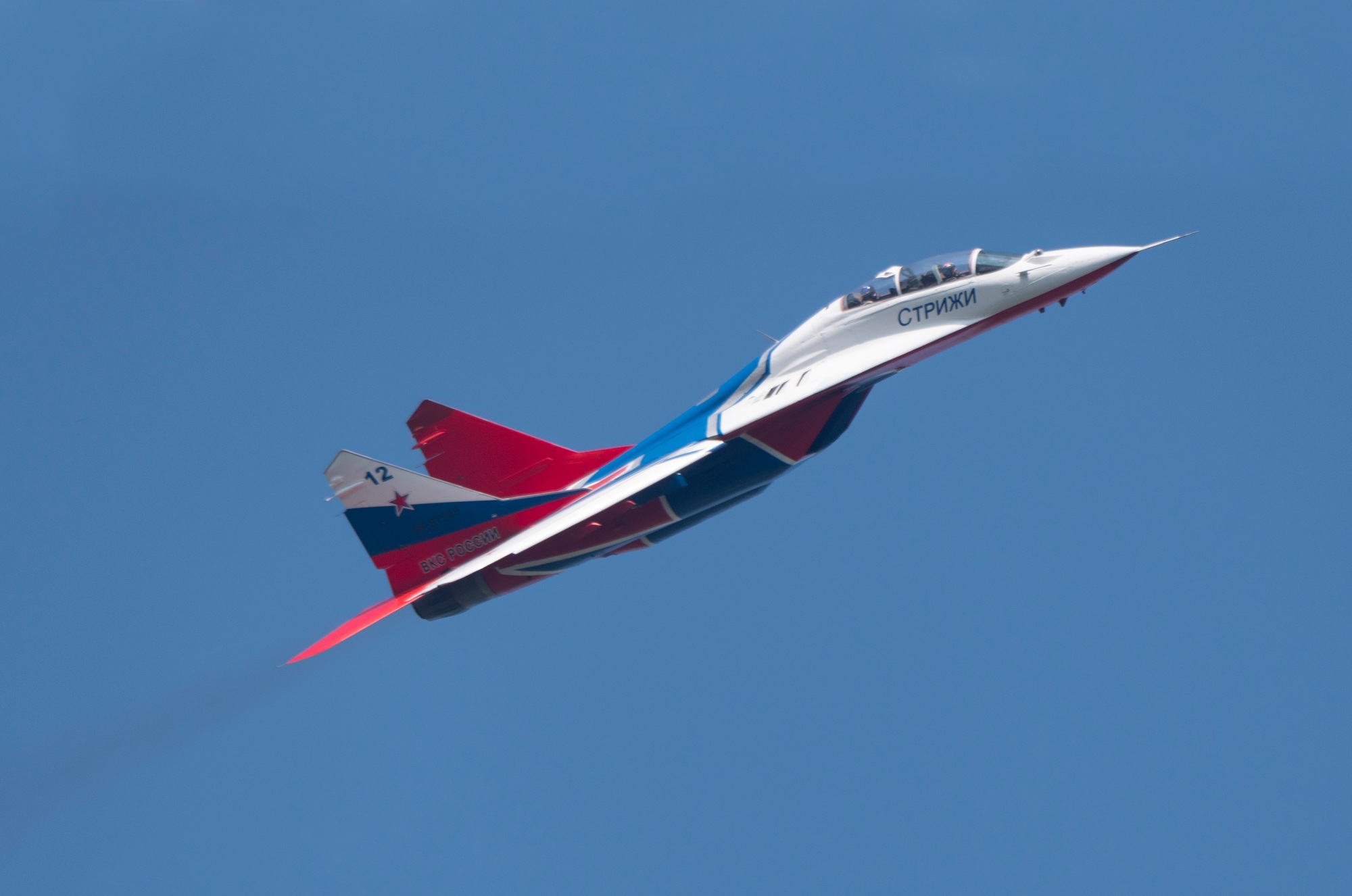 aerobatic team swifts perfoming demonstration flight of the international aerospace salon MAKS-2019
