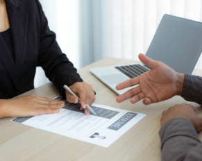 Male job applicants are explaining in detail their work history and Talent to job interviewers writt